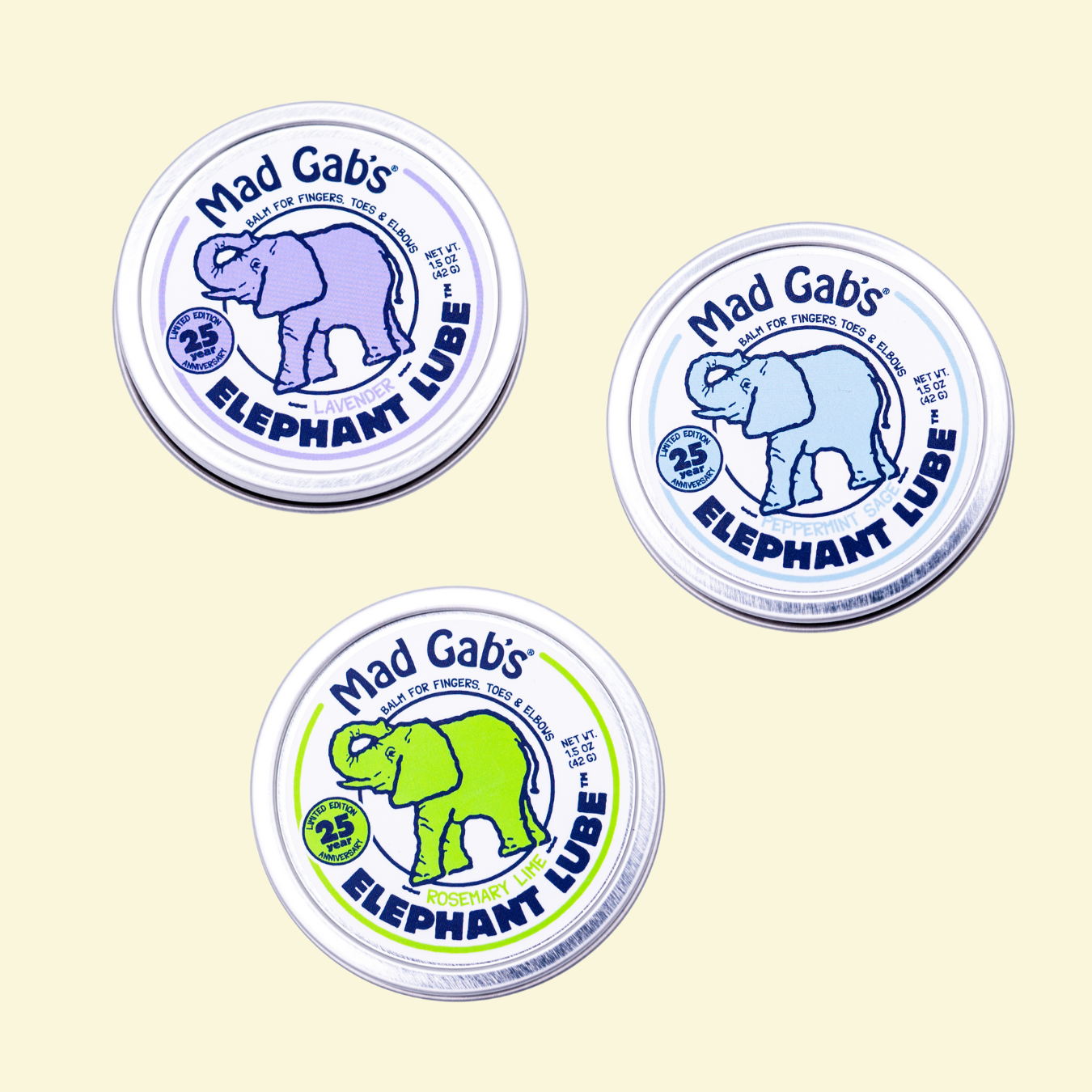 3 tins of Elephant Lube on a pale yellow background