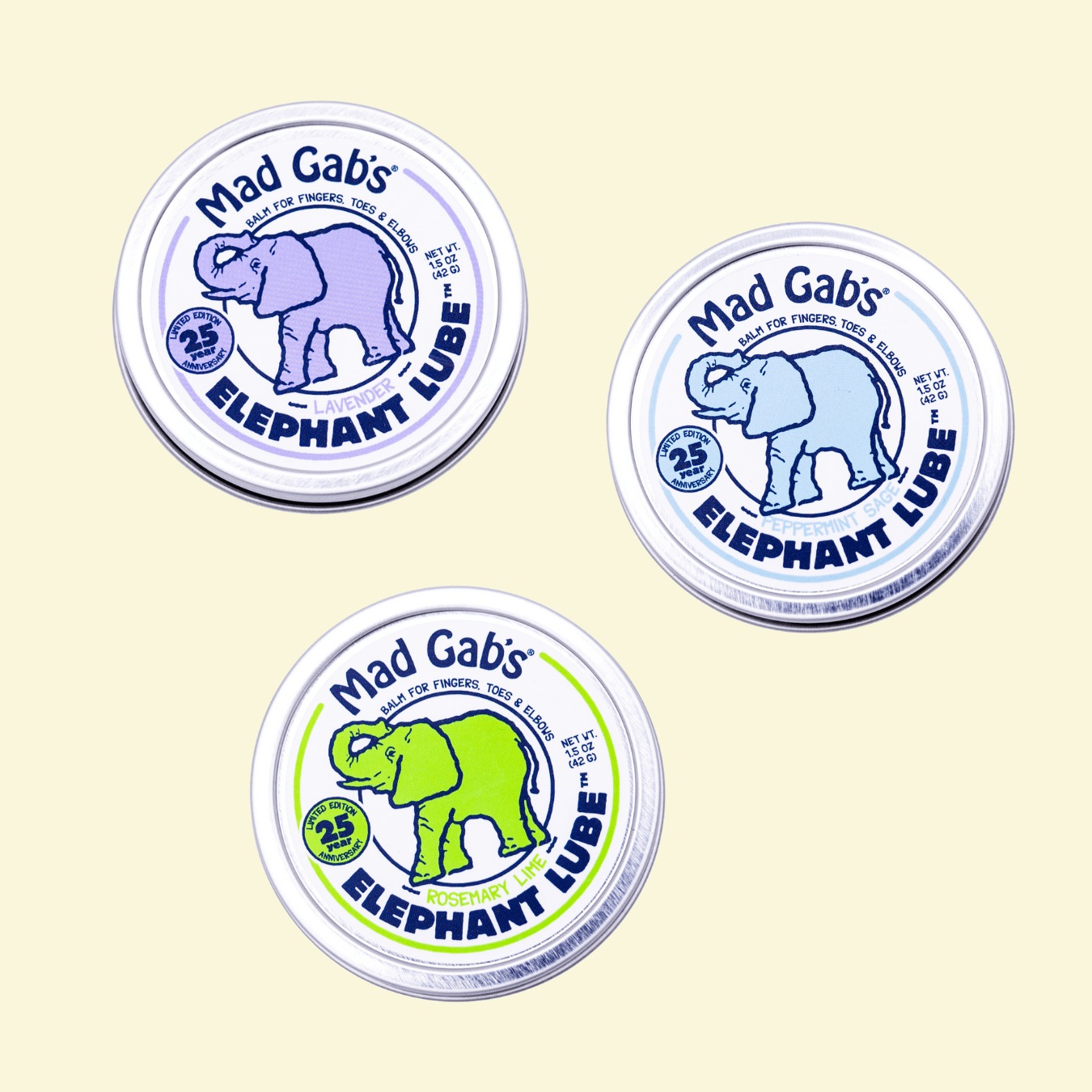 3 tins of Elephant Lube on a pale yellow background