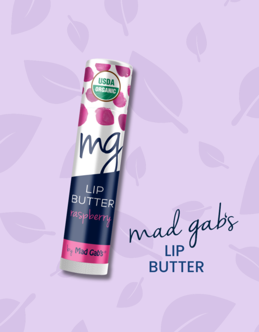 Lip butter container with 'Mad Gabs' branding on a purple background with leaf patterns