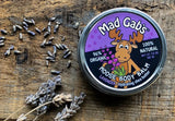 Stylized Photograph of Mad Gab's Lavender Scented Moose Body Balm with Hydrating Shea Butter Single
